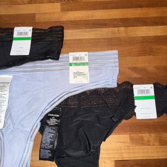 Set of 3 Calvin Klein assorted thong panty black/blue/black large - Picture 6 of 15